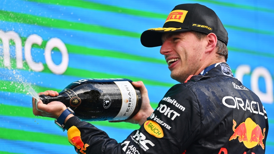 NORTHAMPTON, ENGLAND - JULY 09: Race winner Max Verstappen of the Netherlands and Oracle Red Bull Racing celebrates on the podium during the F1 Grand Prix of Great Britain at Silverstone Circuit on July 09, 2023 in Northampton, England. (Photo by Dan Mullan/Getty Images)