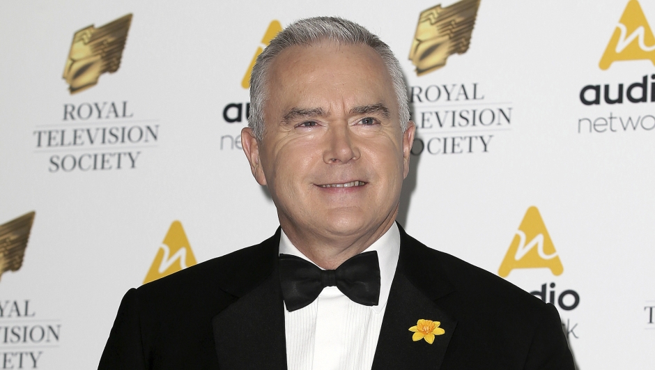 FILE - Journalist Huw Edwards poses for photographers upon arrival at the Royal Television Society Programme Awards at the Grosvenor Hotel in London, Tuesday, March 21, 2017. London police say there's no evidence that a BBC presenter who allegedly paid a teenager for sexually explicit photos committed a crime. The Metropolitan police issued the statement Wednesday, July 12, 2023 as the wife of Huw Edwards identified him as the presenter.  (AP Photos/Tim Ireland, File)