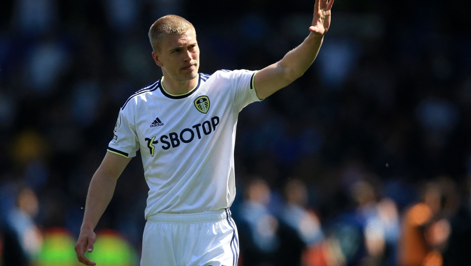 Leeds United's Danish defender Rasmus Kristensen waves at supporters at the end of the English Premier League football match between Leeds United and Newcastle United at Elland Road in Leeds, northern England on May 13, 2023. (Photo by Lindsey Parnaby / AFP) / RESTRICTED TO EDITORIAL USE. No use with unauthorized audio, video, data, fixture lists, club/league logos or 'live' services. Online in-match use limited to 120 images. An additional 40 images may be used in extra time. No video emulation. Social media in-match use limited to 120 images. An additional 40 images may be used in extra time. No use in betting publications, games or single club/league/player publications. /