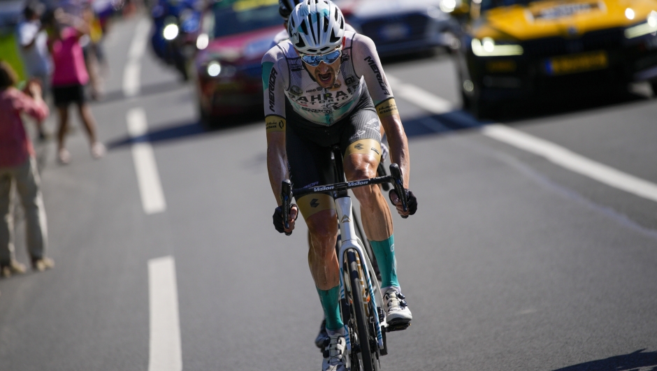 Netherlands' Wout Poels strains as he rides breakaway during the fifteenth stage of the Tour de France cycling race over 179 kilometers (111 miles) with start in Les Gets Les Portes du Soleil and finish in Saint-Gervais Mont-Blanc, France, Sunday, July 16, 2023. (AP Photo/Daniel Cole)