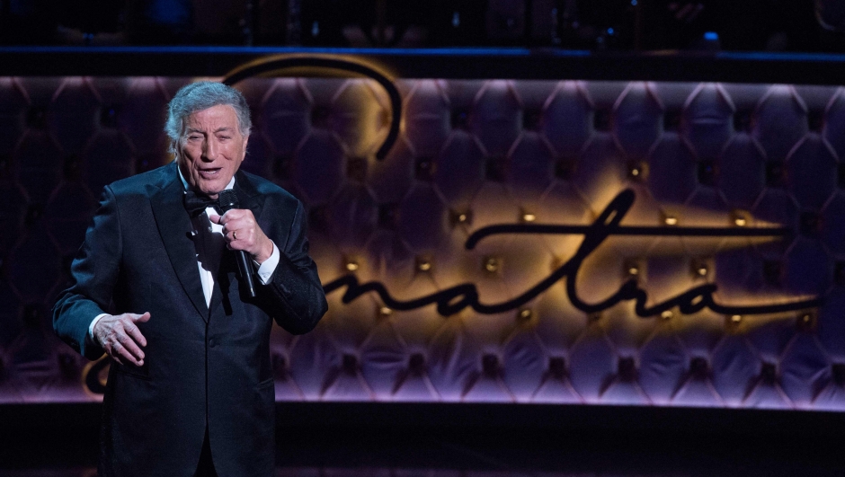 (FILES) Singer Tony Bennett performs at the "Sinatra 100 An All-Star Grammy Concert",  in Las Vegas, Nevada, on December 2, 2015. Bennett, the last in a generation of classic American crooners whose ceaselessly cheery spirit bridged generations to make him a hitmaker across seven decades died on July 21, 2023, in New York, US media reported. He was 96. (Photo by Valerie MACON / AFP)