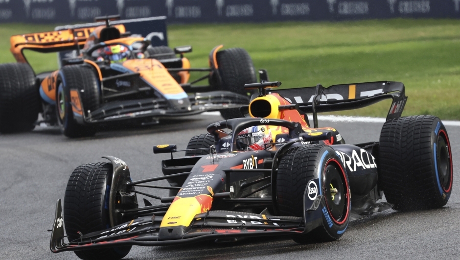 Red Bull driver Max Verstappen of the Netherlands, right, steers his car ahead of McLaren driver Oscar Piastri of Australia during the sprint race ahead of the Formula One Grand Prix at the Spa-Francorchamps racetrack in Spa, Belgium, Saturday, July 29, 2023. The Belgian Formula One Grand Prix will take place on Sunday. (AP Photo/Geert Vanden Wijngaert)