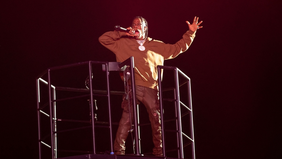 (FILES) Travis Scott performs during the Astroworld Festival at NRG Stadium on November 9, 2019 in Houston, Texas. US rapper Travis Scott will not face criminal charges for the crowd movement that left ten people dead at the Astroworld festival he co-organized in Texas in November 2021, judicial authorities announced on June 29. "No criminal charges will be filed," Harris County District Attorney Kim Ogg's office said in a statement. (Photo by SUZANNE CORDEIRO / AFP)