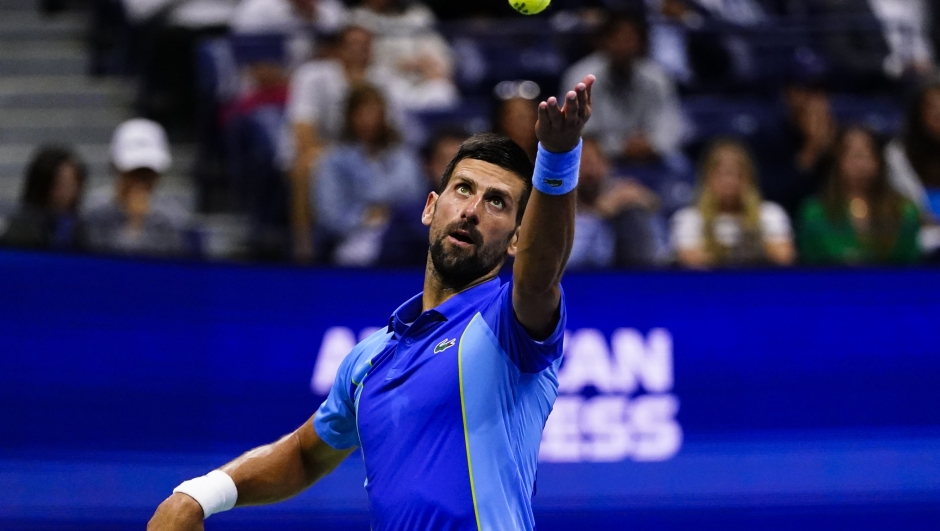 Novak Djokovic, of Serbia, serves to Laslo Djere, of Serbia, during the third round of the U.S. Open tennis championships, Friday, Sept. 1, 2023, in New York. (AP Photo/Frank Franklin II)