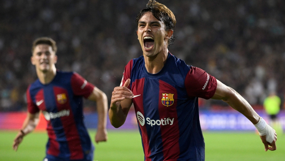 Barcelona's Portuguese forward #14 Joao Felix celebrates after scoring his team's first goal during the Spanish Liga football match between FC Barcelona and Real Betis at the Estadi Olimpic Lluis Companys in Barcelona on September 16, 2023. (Photo by Josep LAGO / AFP)