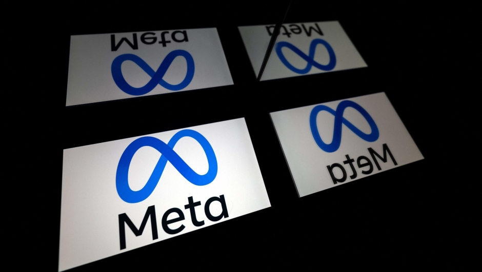 (FILES) This file illustration photo taken on January 12, 2023 in Toulouse, southwestern France, shows a tablet  displaying the logo of the company Meta. - Facebook and Instagram owner Meta will launch a paid subscription service allowing users to verify their accounts, among other features, CEO Mark Zuckerberg said on February 19, 2023. (Photo by Lionel BONAVENTURE / AFP)