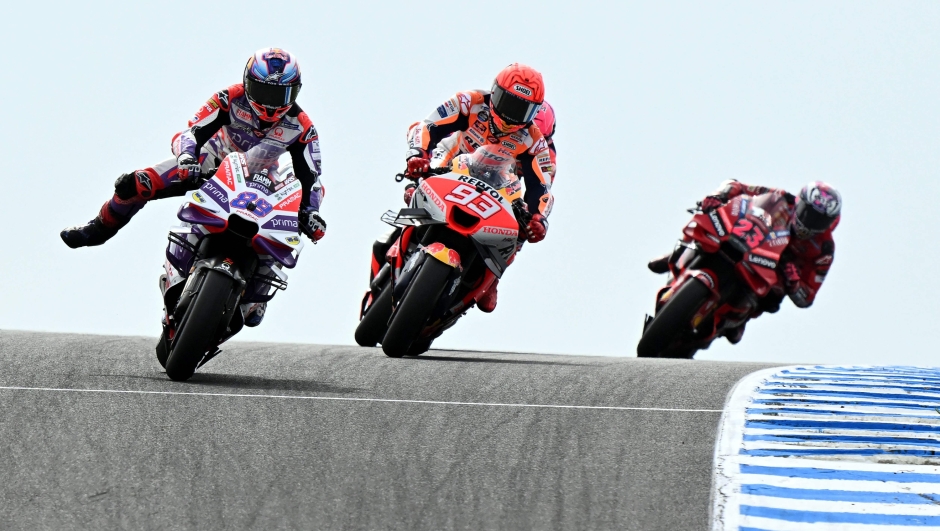 Prima Pramac's Spanish rider Jorge Martin (L) leads the pack during the second free practice session of the MotoGP Australian Grand Prix at Phillip Island on October 21, 2023. (Photo by WILLIAM WEST / AFP) / -- IMAGE RESTRICTED TO EDITORIAL USE - STRICTLY NO COMMERCIAL USE --