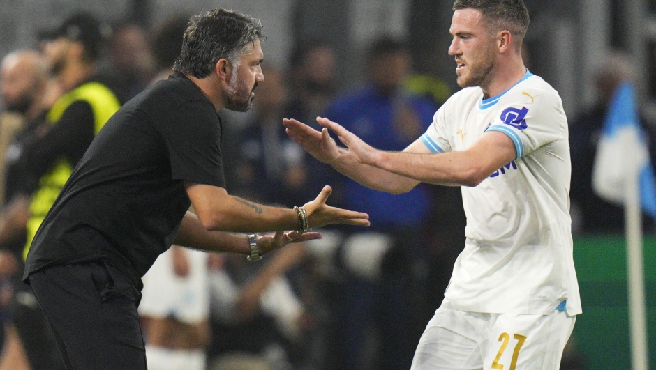 Marseille's Jordan Veretout celebrates with Marseille's head coach Gennaro Gattuso after scoring his side's second goal during the Europa League Group B soccer match between Olympique de Marseille and AEK Athens, at the Velodrome Stadium, in Marseille, France, Thursday, Oct.26, 2023. (AP Photo/Daniel Cole)