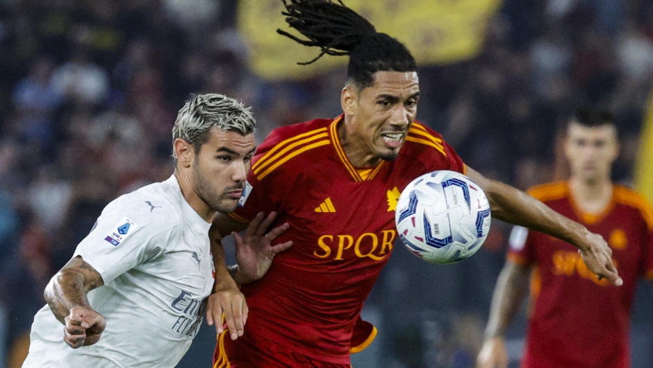 AS Roma's Chris Smalling (R) and AC Milan's Theo Hernandez during the Italian Serie A soccer match between AS Roma and AC Milan at the Olimpico stadium in Rome, Italy, 01 September 2023. ANSA/FABIO FRUSTACI