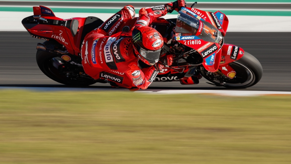 epa10992484 Italianh MotoGP rider Francesco Bagnaia of Ducati Lenovo team takes a bend during a practice session at Ricardo Tormo circuit, in Cheste, Valencia, eastern Spain, 24 November 2023. The Valencian motorcycling Grand Prix takes place on 26 November 2023.  EPA/Biel Alino