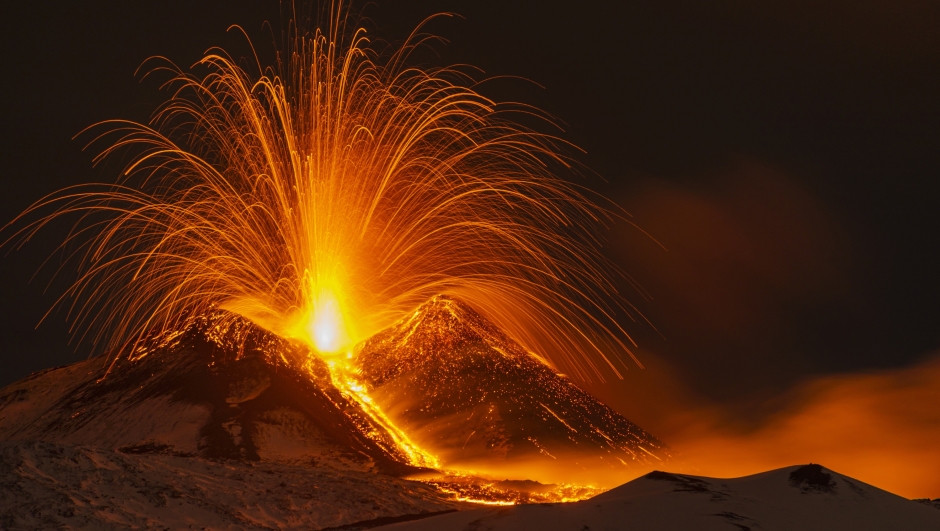 Lava erupts from Southeast crater on Mount Etna seen from Nicolosi near Catania, late evening Friday, Dec. 1, 2023. (AP Photo/Salvatore Allegra)