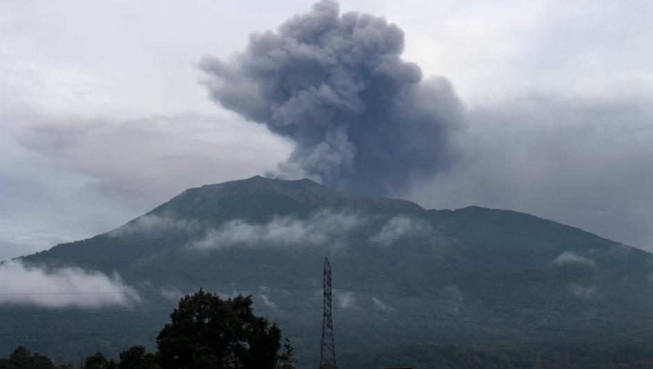Volcanic ash spews from Mount Marapi during an eruption as seen from Batu Palano village in Agam on December 4, 2023. (Photo by ADI PRIMA / AFP)