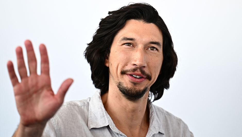 US actor Adam Driver poses during the photocall of the movie "Ferrari" presented in competion at the 80th Venice Film Festival on August 31, 2023 at Venice Lido. (Photo by GABRIEL BOUYS / AFP)