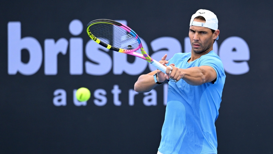 epa11046494 Rafael Nadal of Spain in action during a practice session ahead of the Brisbane International at the Queensland Tennis Centre in Brisbane, Australia 28 December 2023.  EPA/DARREN ENGLAND AUSTRALIA AND NEW ZEALAND OUT