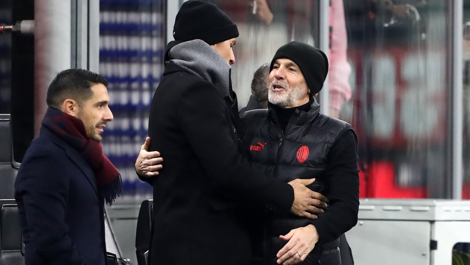 MILAN, ITALY - JANUARY 10: Zlatan Ibrahimovic, Senior Advisor to AC Milan Ownership, interacts with Stefano Pioli, Head Coach of AC Milan, prior to the Coppa Italia match between AC Milan and Atalanta BC on January 10, 2024 in Milan, Italy. (Photo by Marco Luzzani/Getty Images)