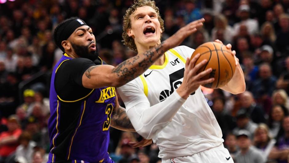 SALT LAKE CITY, UTAH - JANUARY 13: Anthony Davis #3 of the Los Angeles Lakers defends Lauri Markkanen #23 of the Utah Jazz during the first half of a game at Delta Center on January 13, 2024 in Salt Lake City, Utah. NOTE TO USER: User expressly acknowledges and agrees that, by downloading and or using this photograph, User is consenting to the terms and conditions of the Getty Images License Agreement.   Alex Goodlett/Getty Images/AFP (Photo by Alex Goodlett / GETTY IMAGES NORTH AMERICA / Getty Images via AFP)