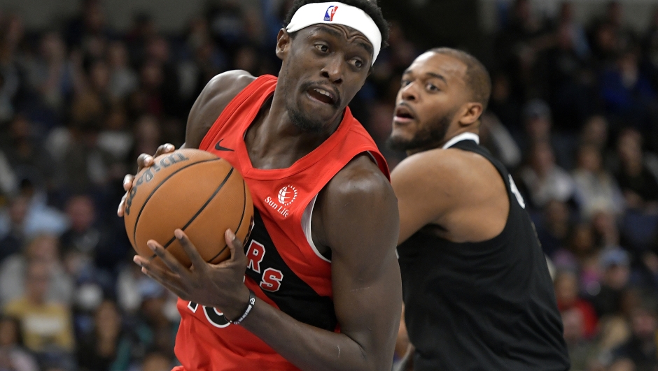 Toronto Raptors forward Pascal Siakam works against Memphis Grizzlies forward Xavier Tillman during the first half of an NBA basketball game Wednesday, Jan. 3, 2024, in Memphis, Tenn. (AP Photo/Brandon Dill)