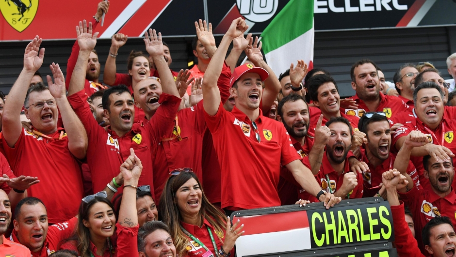 Monaco's Formula One driver Charles Leclerc of Scuderia Ferrari celebrates with team members after winning winning the Italian Formula One Grand Prix at the Monza Autodrome in Monza, Italy, 8 September 2019. ANSA/DANIEL DAL ZENNARO