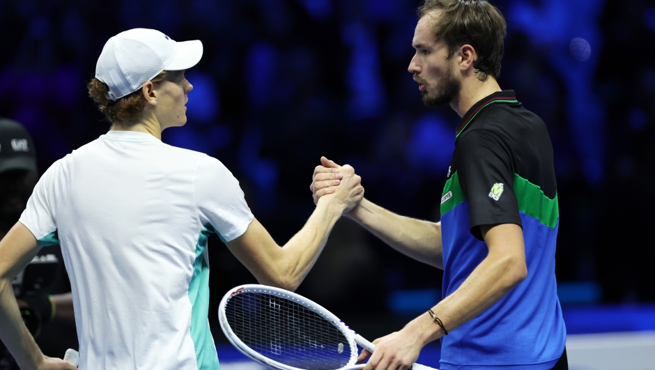 TURIN, ITALY - NOVEMBER 18: Jannik Sinner of Italy embraces Daniil Medvedev after the Men's Singles Semi Final match on day seven of the Nitto ATP Finals at Pala Alpitour on November 18, 2023 in Turin, Italy. (Photo by Clive Brunskill/Getty Images)