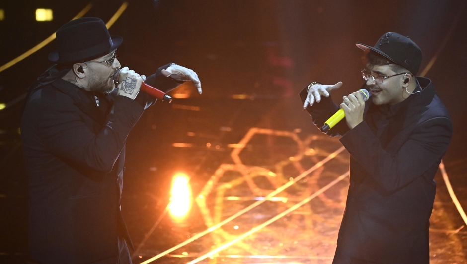 Italian singes Geolier (R) and  Gue' perform on stage at the Ariston theatre during the 74th Sanremo Italian Song Festival in Sanremo, Italy, 09 February 2024. The music festival runs from 06 to 10 February 2024.   ANSA/RICCARDO ANTIMIANI