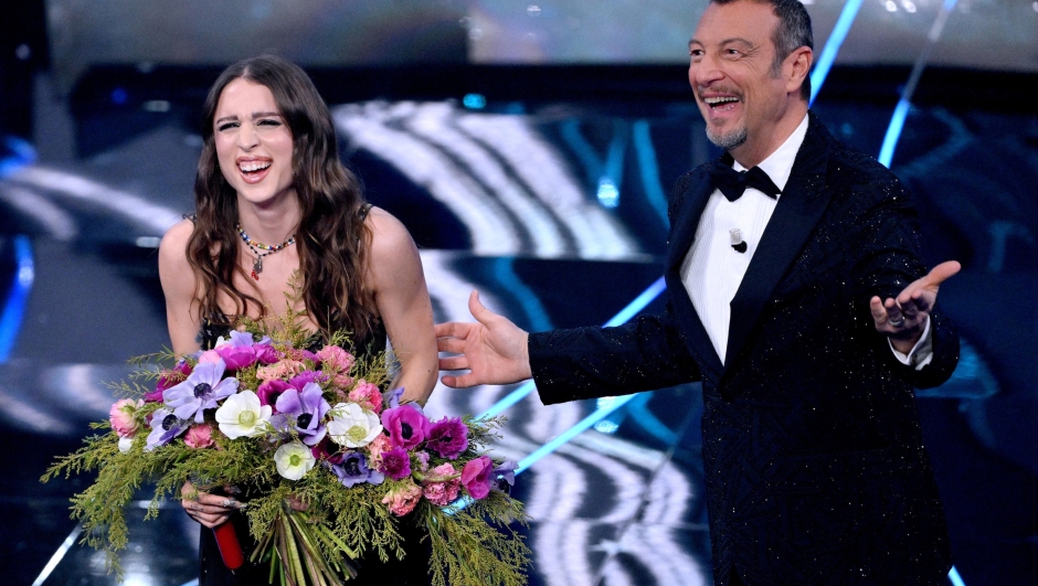 Italian singer Angelina Mango (L) and Sanremo Festival host and artistic director Amadeus on stage at the Ariston theatre during the 74rd Sanremo Italian Song Festival, Sanremo, Italy, 10 February 2024. The music festival will run from 06 to 10 February 2024.  ANSA/ETTORE FERRARI