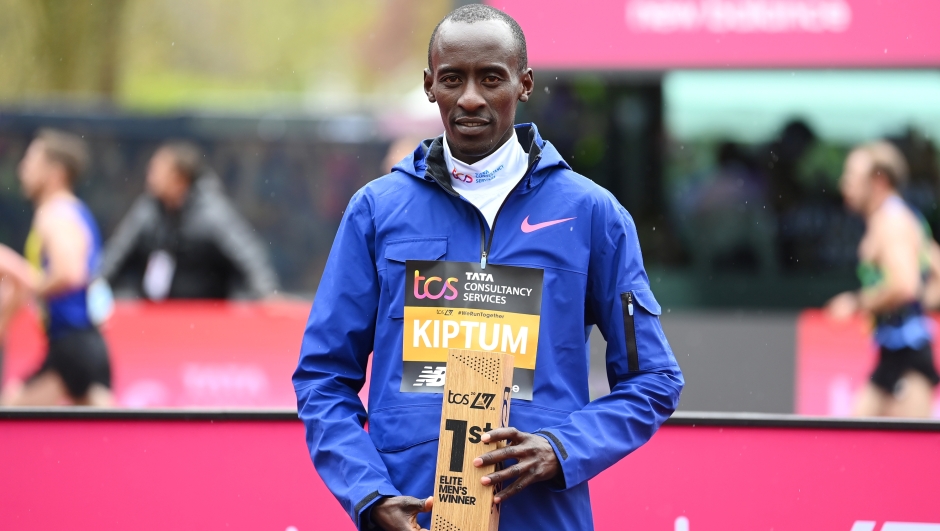 LONDON, ENGLAND - APRIL 23: Kelvin Kiptum of Kenya celebrates with the first place trophy after winning the Elite Men's Marathon during the 2023 TCS London Marathon on April 23, 2023 in London, England. (Photo by Alex Davidson/Getty Images) Men's marathon world record holder, Kelvin Kiptum, 24, has died in a road accident in his home country alongside his coach, Rwanda's Gervais Hakizimana.
