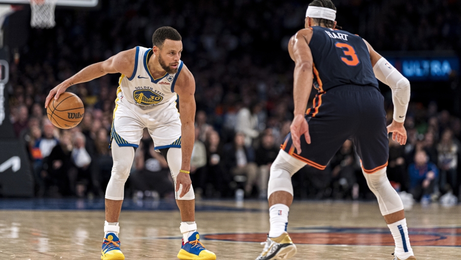 New York Knicks guard Josh Hart (3) defends against Golden State Warriors guard Stephen Curry (30) during the second half of an NBA basketball game in New York, Thursday, Feb. 29, 2024. (AP Photo/Peter K. Afriyie)