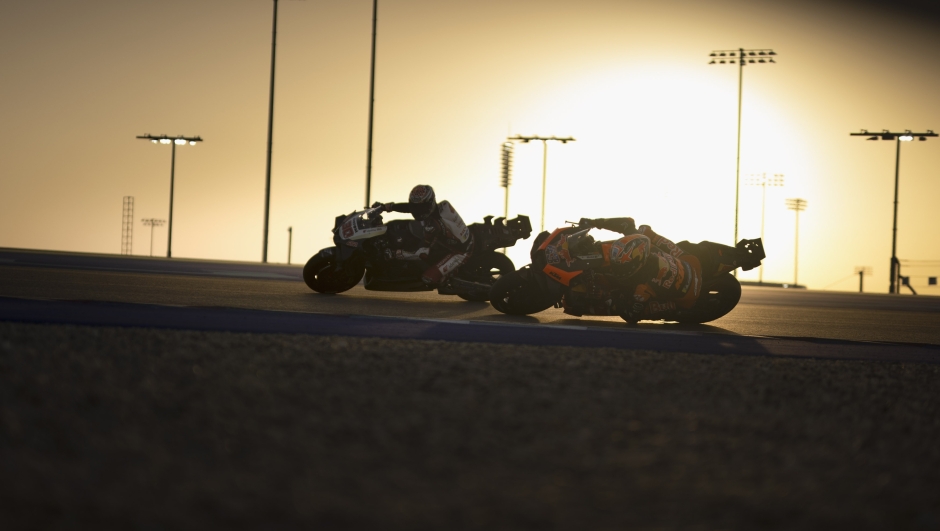 DOHA, QATAR - FEBRUARY 20: Takaaki Nakagami of Japan and IDEMITSU Honda LCR  leads  Jack Miller of Australia and Bull KTM Factory Racing during the Qatar MotoGP Official Test at Losail Circuit on February 20, 2024 in Doha, Qatar. (Photo by Mirco Lazzari gp/Getty Images)