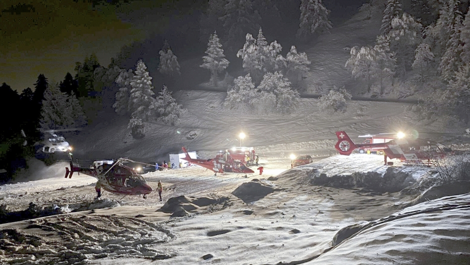 Mountain rescuers and helicopters participate in a rescue mission the Tete Blanche mountain in the Swiss alps mountains, near Sion, Switzerland, Sunday, March 10, 2024. Five cross-country skiers have been found dead after going missing over the weekend near Switzerland?s famed Matterhorn, Swiss police said Monday. Rescue authorities announced a search in difficult weather conditions Sunday for six skiers missing. The group set off Saturday on a route between the resort town of Zermatt, at the foot of the Matterhorn, and the village of Arolla, near the border with Italy. (Valais cantonal police via AP)
