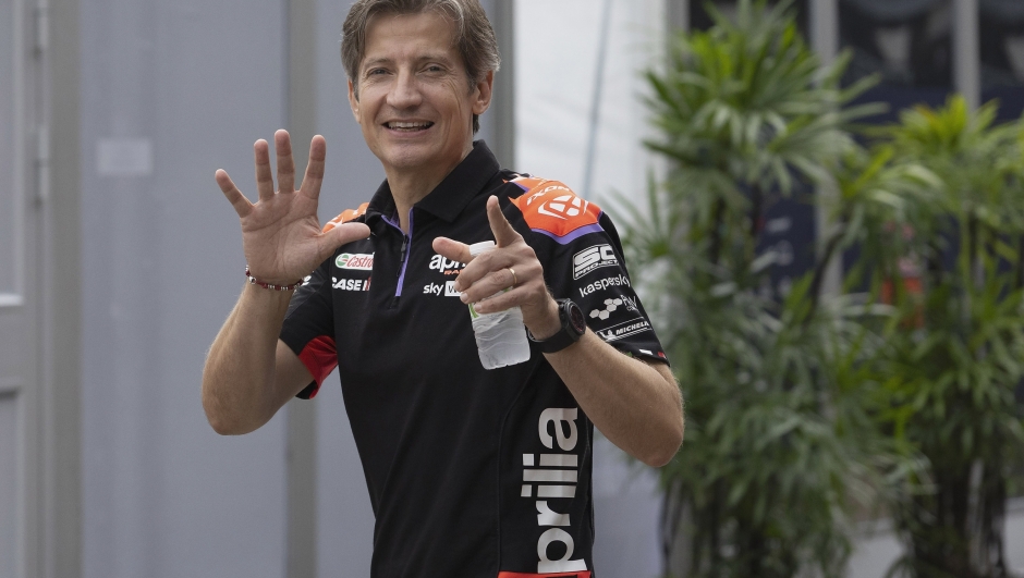 BURIRAM, THAILAND - SEPTEMBER 29: Massimo Rivola of Italy and Aprilia Sports Director greets in paddock during the MotoGP of Thailand - Previews at Chang International Circuit on September 29, 2022 in Buriram, Thailand. (Photo by Mirco Lazzari gp/Getty Images)