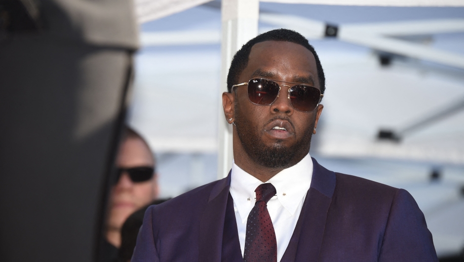 (FILES) Sean "Diddy" Combs attends the star ceremony for Mary J. Blige, on the Hollywood Walk of Fame, January 11, 2018 in Hollywood, California. More sexual assault claims have been filed against Sean Combs in New York, after the rap mogul known as "Diddy" and R&B singer Cassie settled a suit alleging physical abuse and rape last week. A lawsuit filed November 23 by Joi Dickerson-Neal alleged she had been "drugged, sexually assaulted and abused" in 1992 by the rapper, also known as "Puff Daddy," and that he had filmed and distributed the acts as "revenge porn." The suits have been submitted under the New York Adult Survivors Act, a law that opened a one-year window for sexual assault claims to be filed that otherwise happened too far in the past to litigate. (Photo by Robyn Beck / AFP)