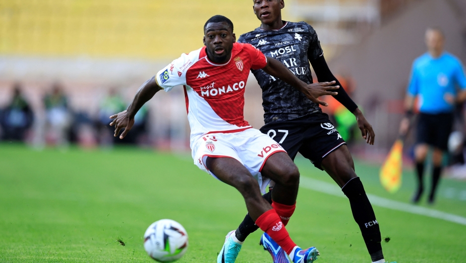 Monaco's French midfielder #19 Youssouf Fofana (L) fights for the ball with Metz's Haitian midfielder #27 Danley Jean Jacques (R) during the French L1 football match between AS Monaco and FC Metz at the Louis II Stadium (Stade Louis II) in the Principality of Monaco on October 22, 2023. (Photo by Valery HACHE / AFP)