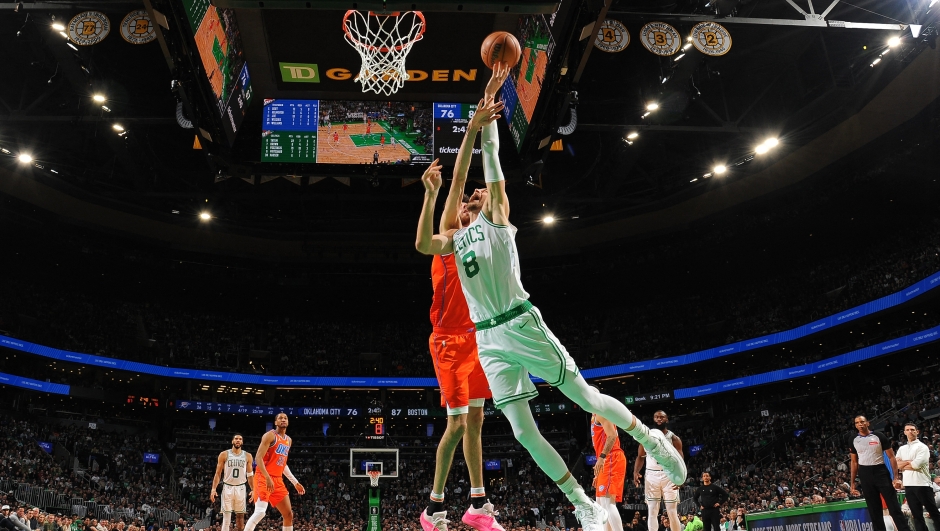BOSTON, MA - APRIL 3: Kristaps Porzingis #8 of the Boston Celtics drives to the basket during the game against the Oklahoma City Thunder on April 3, 2024 at the TD Garden in Boston, Massachusetts. NOTE TO USER: User expressly acknowledges and agrees that, by downloading and or using this photograph, User is consenting to the terms and conditions of the Getty Images License Agreement. Mandatory Copyright Notice: Copyright 2024 NBAE   Brian Babineau/NBAE via Getty Images/AFP (Photo by Brian Babineau / NBAE / Getty Images / Getty Images via AFP)