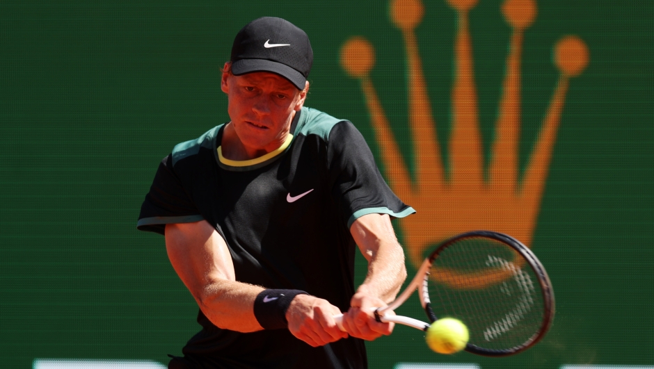 MONTE-CARLO, MONACO - APRIL 12: Jannik Sinner of Italy plays a backhand against Holger Rune of Denmark during the quarter-final match on day six of the Rolex Monte-Carlo Masters at Monte-Carlo Country Club on April 12, 2024 in Monte-Carlo, Monaco. (Photo by Julian Finney/Getty Images)