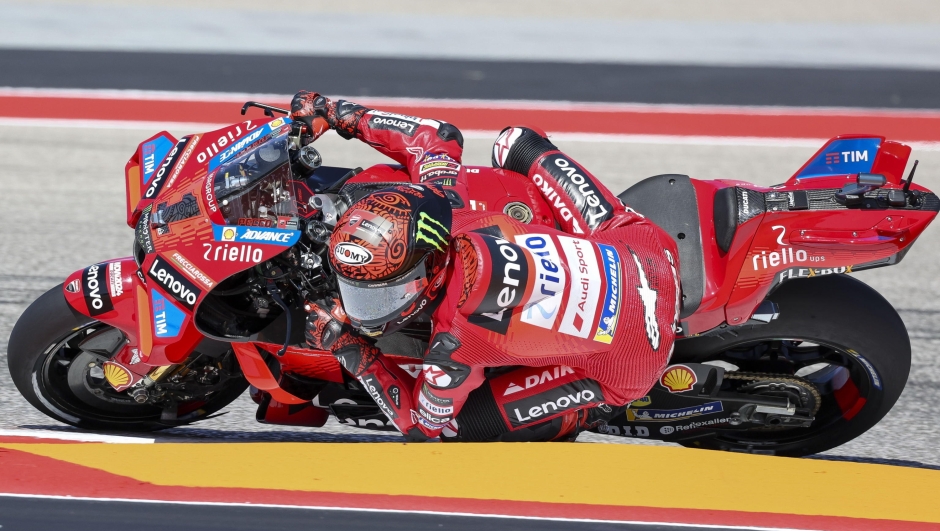 epa11275211 Italian rider Francesco Bagnaia of the Ducati Lenovo Team in action during the first free practice session of the MotoGP category for the Motorcycling Grand Prix of The Americas at the Circuit of The Americas in Austin, Texas, USA, 12 April 2024.  EPA/ADAM DAVIS