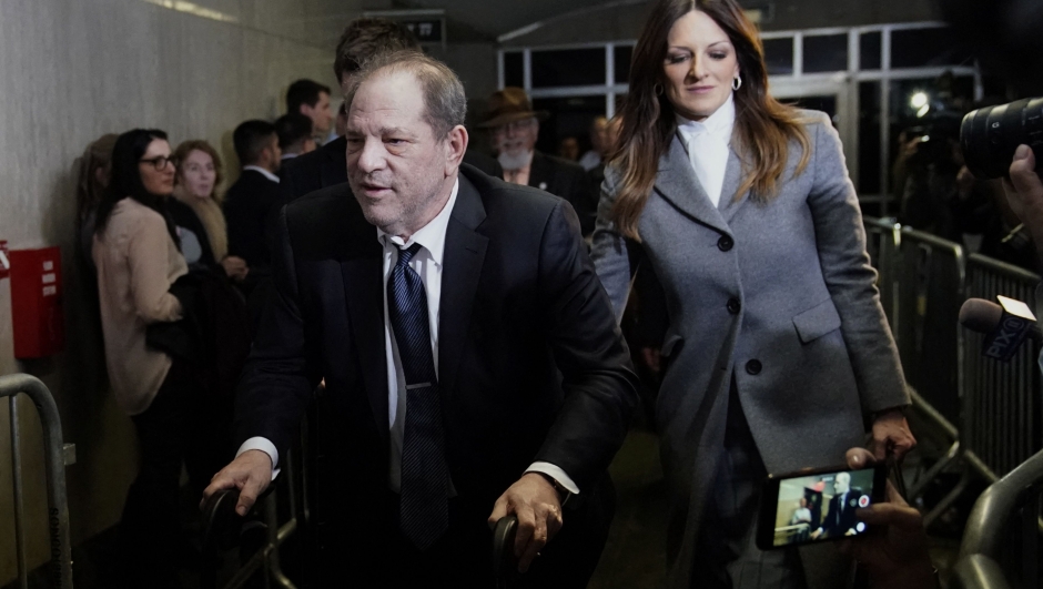 (FILES) Harvey Weinstein leaves the Manhattan Criminal Court, as a jury continues with deliberations on February 21, 2020, in New York City. New York's highest court on April 25, 2024, overturned Hollywood producer Weinstein's 2020 conviction on sex crime charges and ordered a new trial. In their decision, judges cited errors in the way the trial had been conducted, including admitting the testimony of women who were not part of the charges against him. "Order reversed and a new trial ordered," the judges wrote. (Photo by TIMOTHY A. CLARY / AFP)