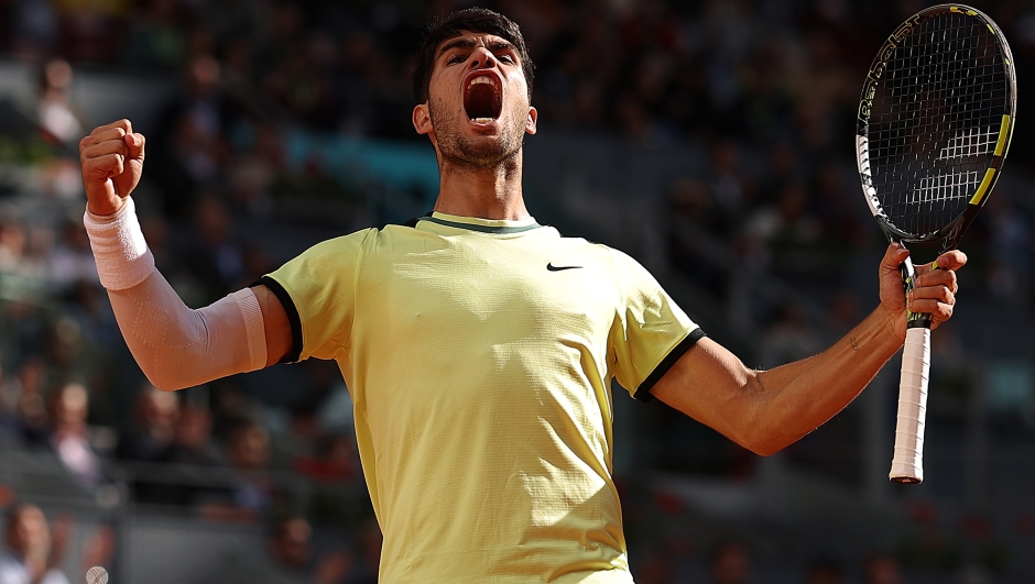 MADRID, SPAIN - APRIL 30: Carlos Alcaraz of Spain celebrates winning a point against Jan-Lennard Struff of Germany during their Men's Round of 16 match on day eight of the Mutua Madrid Open at La Caja Magica on April 30, 2024 in Madrid, Spain. (Photo by Julian Finney/Getty Images)