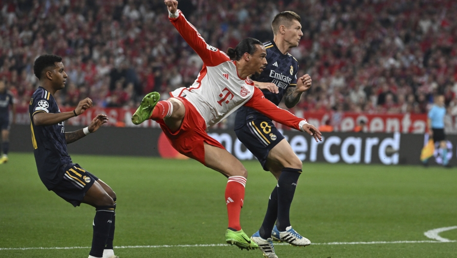 Bayern's Leroy Sane scores his side's first goal during the Champions League, semifinal first leg, soccer match between FC Bayern Munich and Real Madrid in Munich, Germany, Tuesday, April 30, 2024. (Sven Hoppe/dpa via AP)