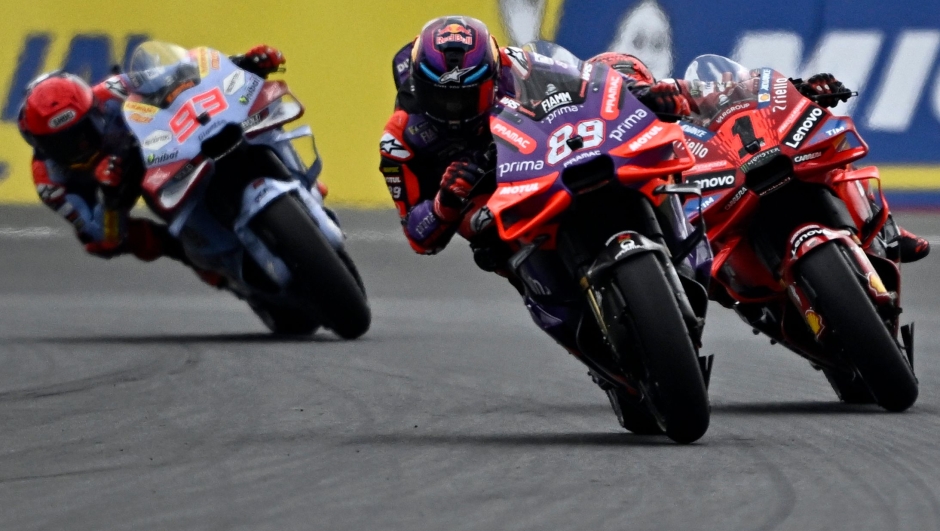 (From L) Gresini Racing MotoGP's Spanish rider Marc Marquez, Prima Pramac Racing's Spanish rider Jorge Martin and Ducati Lenovo Team's Italian rider Francesco Bagnaia compete during the French MotoGP Grand Prix race at the Bugatti circuit in Le Mans, northwestern France, on May 12, 2024. (Photo by JULIEN DE ROSA / AFP)