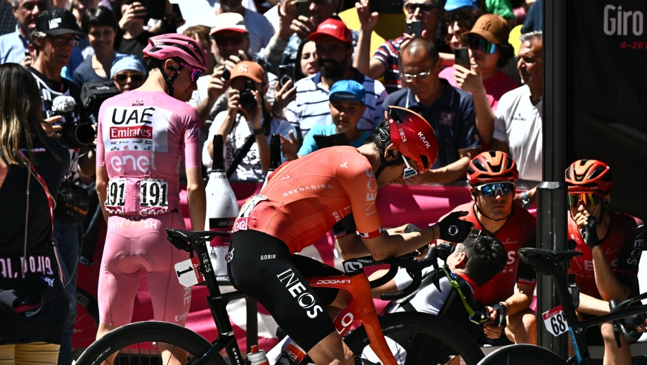 (L-R) Slovenian rider Tadej Pogacar of  team Uae Emirates wearing the overall leader's pink jersey, british rider Gerent Thomas of Ineos Grenadiers team prior the signing podium ahead the departure of the 9th stage of the 107 Giro d'Italia 2024, cycling race over 214 km from Avezzano to Napoli, Italy, 12 May 2024. ANSA/LUCA ZENNARO