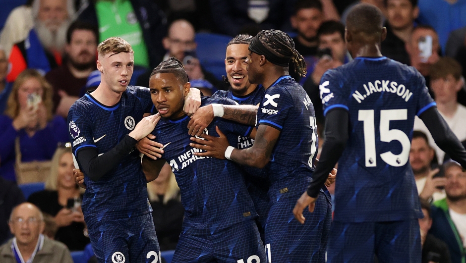 BRIGHTON, ENGLAND - MAY 15: Christopher Nkunku of Chelsea celebrates scoring his team's second goal with teammates during the Premier League match between Brighton & Hove Albion and Chelsea FC at American Express Community Stadium on May 15, 2024 in Brighton, England. (Photo by Ryan Pierse/Getty Images)