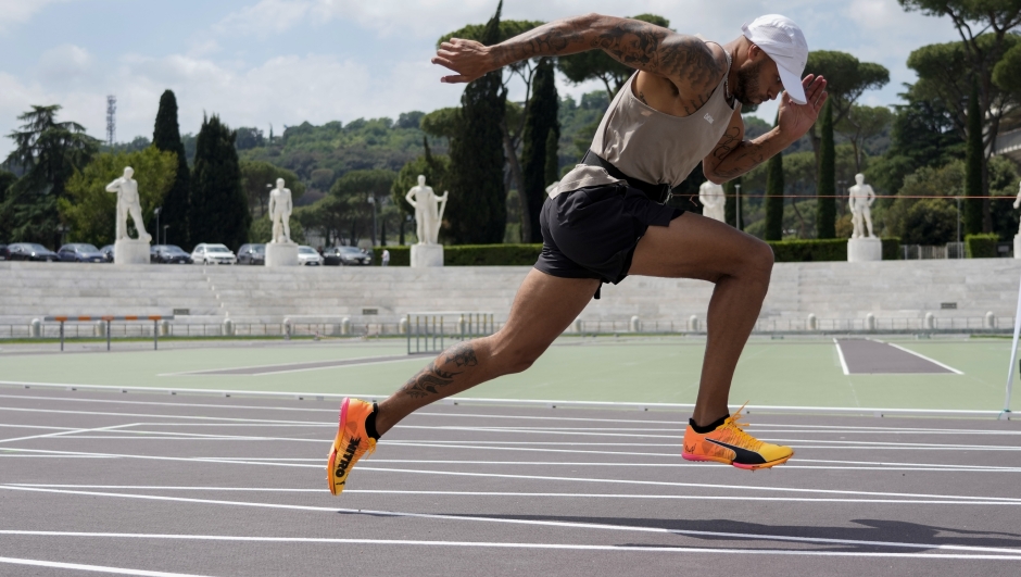 Defending Olympic 100 meters champion Marcell Jacobs trains in the historic Stadio dei Marmi ahead of an athletics meeting in Rome, Wednesday, May 15, 2024. (AP Photo/Alessandra Tarantino)