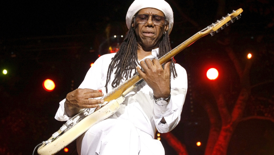 FILE - Guitarist Nile Rodgers of Chic performs at the Jazz Festival of 5 Continents, in Marseille, southern France, July 20, 2013. Rodgers, American songwriter and co-founder of the influential 1970s disco band Chic and esteemed Finnish classical music composer and conductor Esa-Pekka Salonen have won the 2024 Polar Music Prize, a Swedish music award, the award panel announced Tuesday, March 12, 2024. (AP Photo/Claude Paris, file)