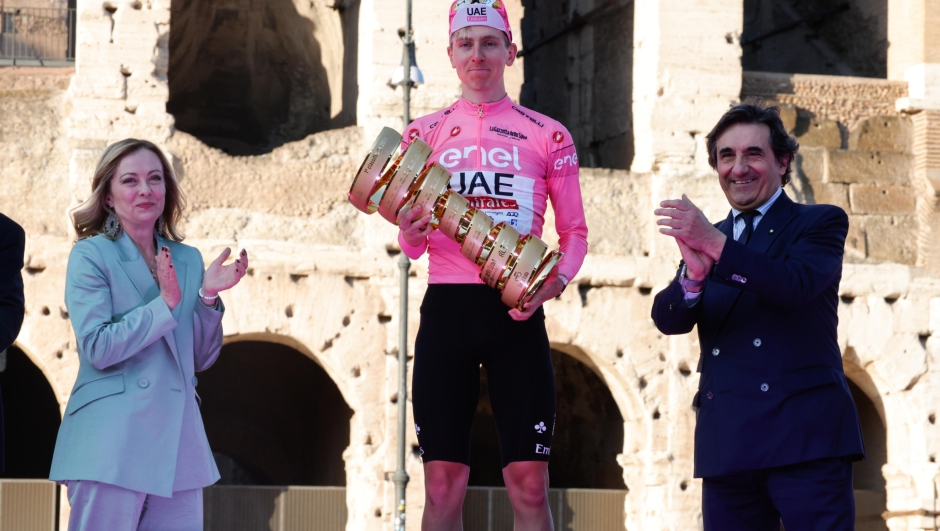 Italy's Prime Minister Giorgia Meloni, Slovenian rider Tadej Pogacar of Uae Team Emirates and Urbano Cairo celebrates with the trophy after winning of the Giro d'Italia 2024 cycling tour, in Rome, Italy, 25 May 2024
