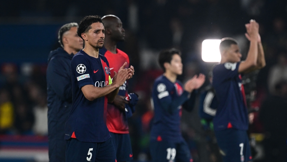 Paris Saint-Germain's Brazilian defender #05 Marquinhos (2L) applauds the fans at the end of the UEFA Champions League semi-final second leg football match between Paris Saint-Germain (PSG) and Borussia Dortmund, at the Parc des Princes stadium in Paris on May 7, 2024. (Photo by MIGUEL MEDINA / AFP)