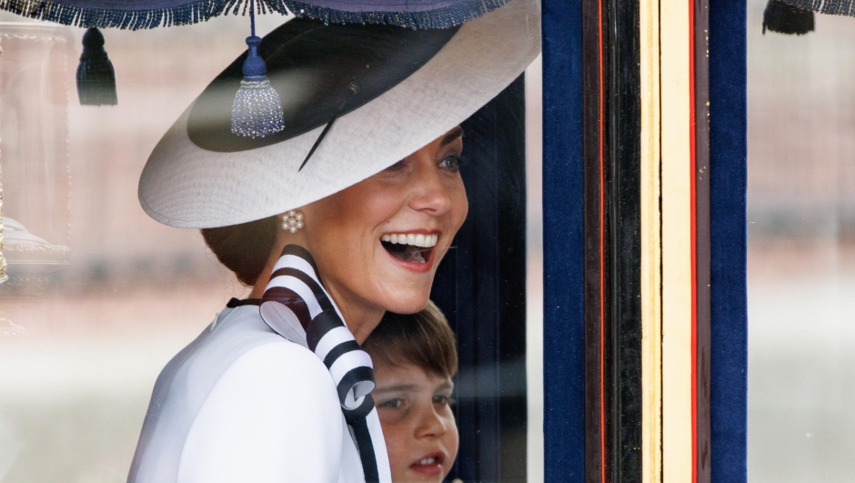 epaselect epa11411636 Britain's Catherine Princess of Wales (front) smiles as she travels with Prince Louis (back) from Buckingham Palace to Horse Guards Parade inside a carriage during the Trooping the Colour parade in London, Britain, 15 June 2024. The Princess of Wales made her first public appearance since she disclosed that she has been diagnosed with cancer in March 2024. The king's birthday parade, traditionally known as Trooping the Colour, is a ceremonial military parade to celebrate the official birthday of the British sovereign.  EPA/TOLGA AKMEN