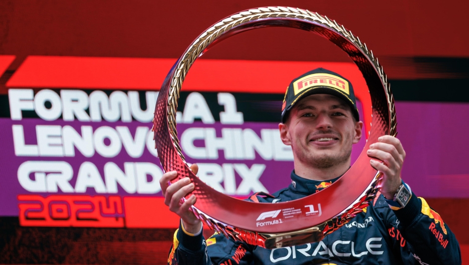 epa11291211 Red Bull Racing driver Max Verstappen of the Netherlands celebrates with his trophy after winning the Formula One Chinese Grand Prix, in Shanghai, China, 21 April 2024. The 2024 Formula 1 Chinese Grand Prix is held at the Shanghai International Circuit racetrack on 21 April after a five-year hiatus.  EPA/ALEX PLAVEVSKI