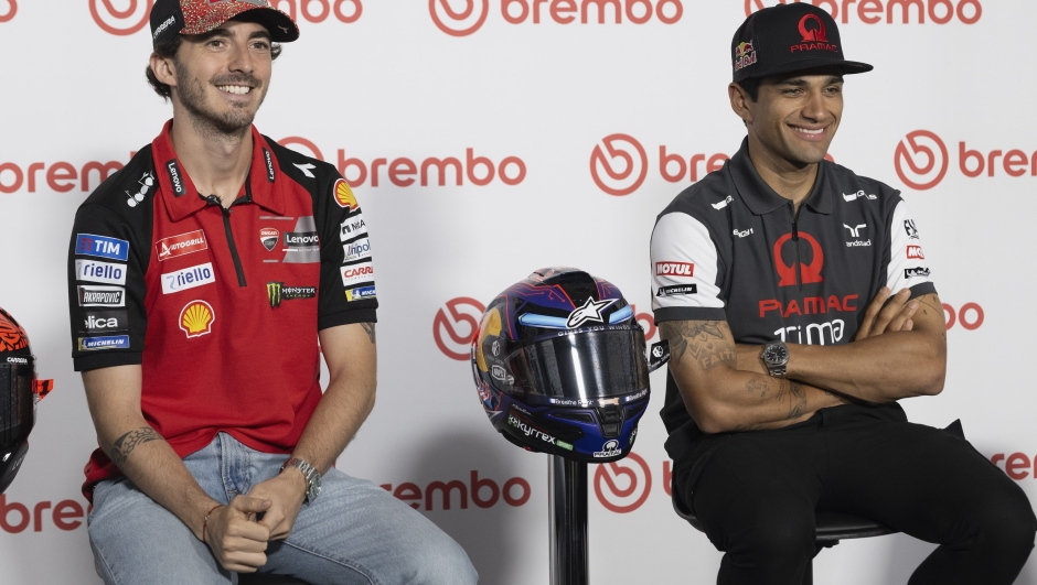SCARPERIA, ITALY - MAY 30: (L-R) Francesco Bagnaia of Italy and Ducati Lenovo Team and Jorge Martin of Spain and Prima Pramac Racing smile during the press conference during the MotoGP Of Italy - Previews at Mugello Circuit on May 30, 2024 in Scarperia, Italy. (Photo by Mirco Lazzari gp/Getty Images)