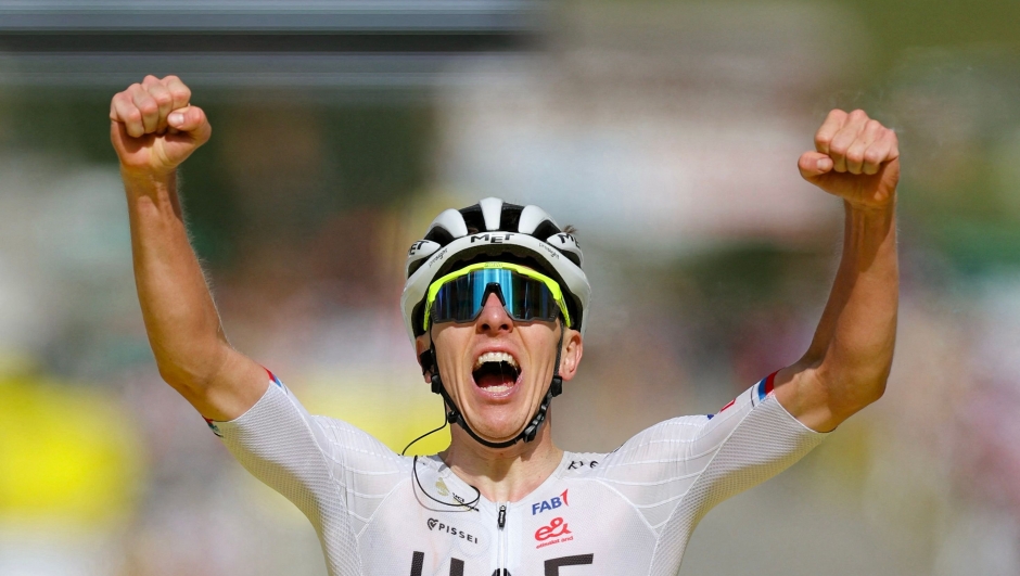 UAE Team Emirates team's Slovenian rider Tadej PogacarXXXXXXX cycles to the finish line to win the 4th stage of the 111th edition of the Tour de France cycling race, 140 km between Pinerolo in Italy, and Valloire in France, on July 2, 2024. (Photo by Thomas SAMSON / AFP)