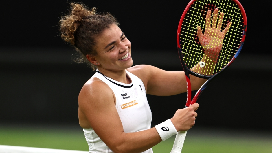 LONDON, ENGLAND - JULY 09: Jasmine Paolini of Italy celebrates winning match point against Emma Navarro of United States in the Ladies' Singles Quarter Final match during day nine of The Championships Wimbledon 2024 at All England Lawn Tennis and Croquet Club on July 09, 2024 in London, England. (Photo by Francois Nel/Getty Images)